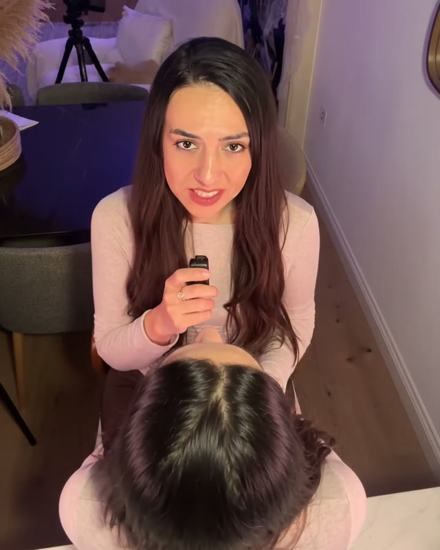 A failed AI shot: an overhead view with a second head in the foreground and a camera on a tripod in the background